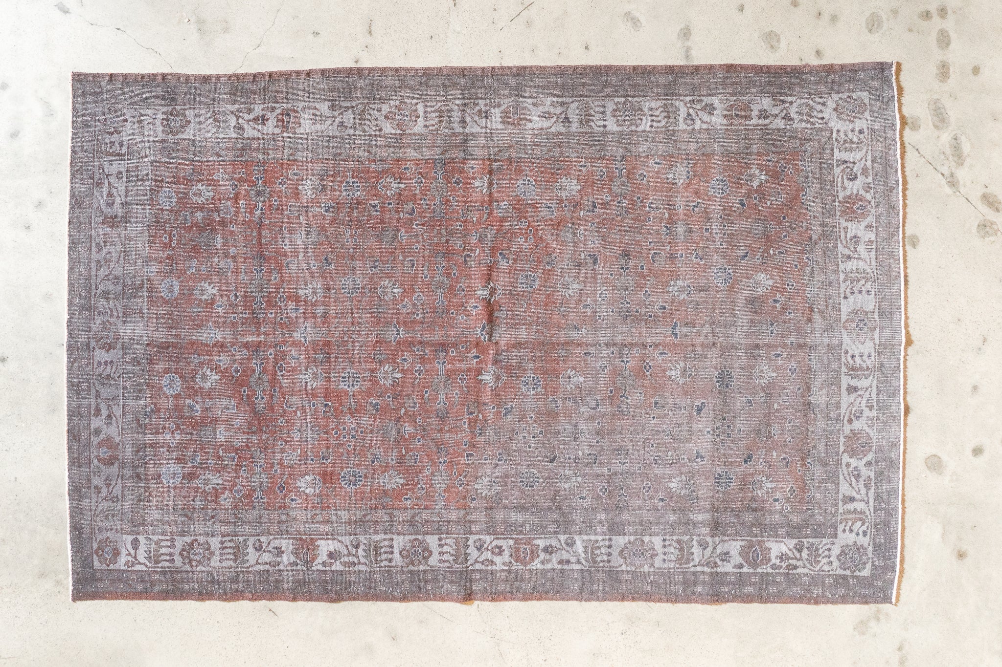 Vintage burgundy and black wool rug with cotton weave