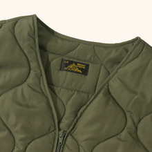 Vinis - Sleeveless quilted jacket