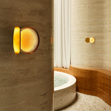 Powder compact wall light