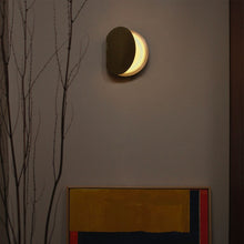 Powder compact wall light