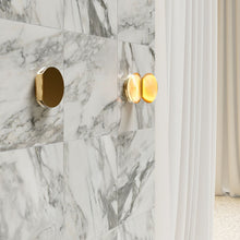 Powder compact wall light