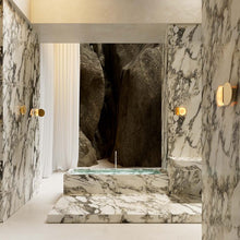 Powder compact wall light