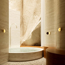 Powder compact wall light