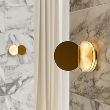 Powder compact wall light